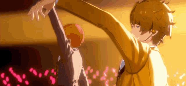 a man in a yellow jacket is holding another man 's hand