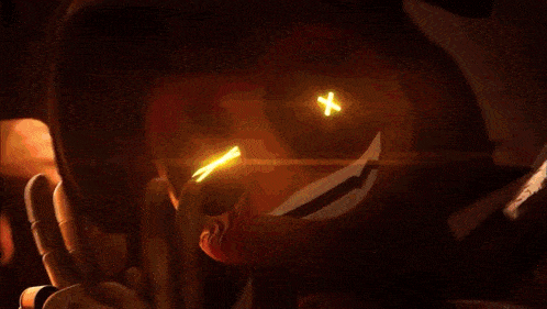 a close up of a person 's face with glowing eyes and a x on it