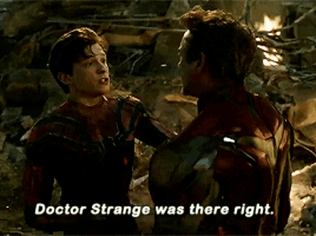two men standing next to each other with the words doctor strange was there right