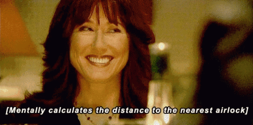 a woman is smiling with the words mentally calculates the distance to the nearest airlock below her