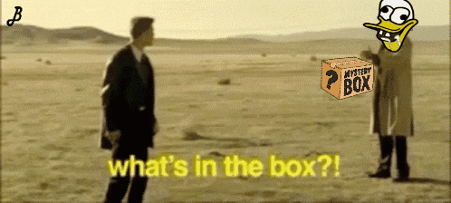 two men standing in the desert with a box that says mystery box above them