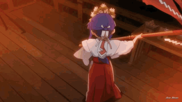a girl with purple hair is wearing a crown of flowers