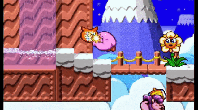 a video game with kirby and a flower on the side