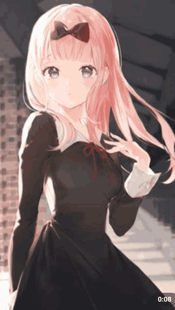 a girl with pink hair is wearing a black dress with a bow on her head