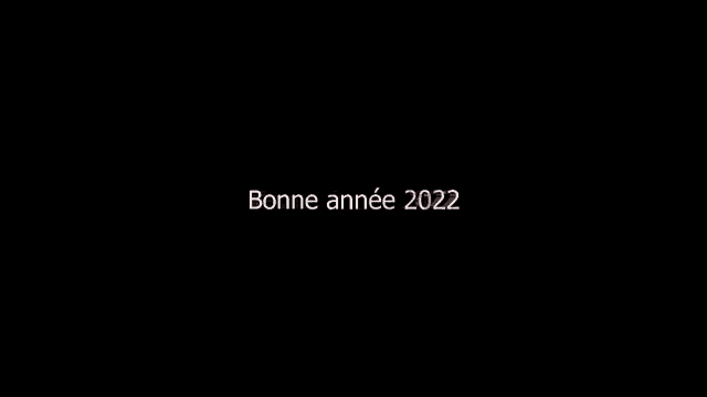 a black background with a few letters on it .