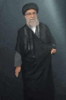 a man with a beard wearing a black hat and a black robe