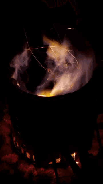 a fire with sparks coming out of it