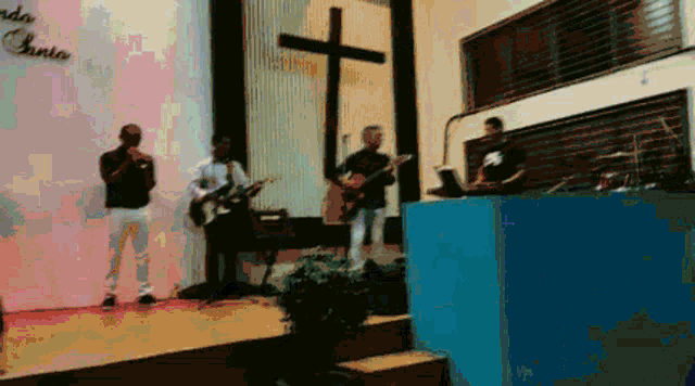a group of men playing instruments on a stage in front of a wall that says " cando cante "