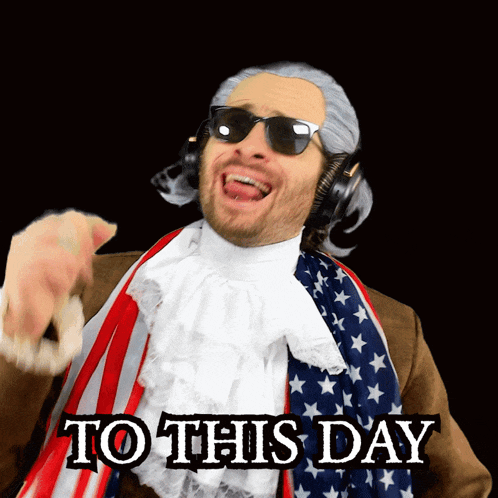 a man wearing a wig and sunglasses is pointing at the camera with the words to this day below him