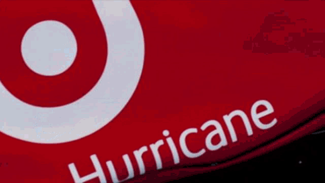 a large building with a hurricane lancaster sign on top