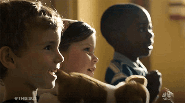 a group of children are watching a tv show called thisisus
