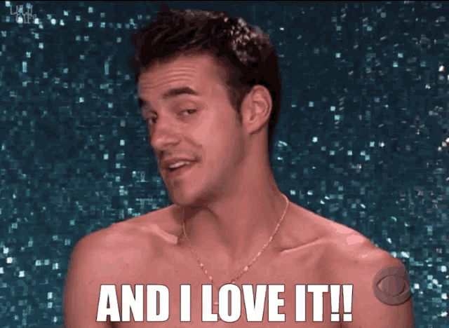 a shirtless man with the words " and i love it " on his chest