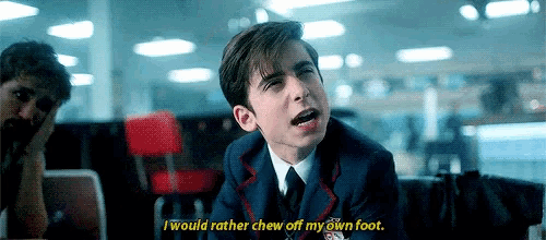 a young man in a suit and tie is saying i would rather chew off my own foot