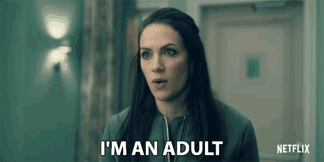 a woman says i 'm an adult in front of a netflix logo