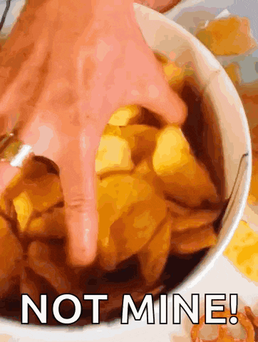 a person is dipping their finger into a bowl of chips with the words not mine written on the bottom