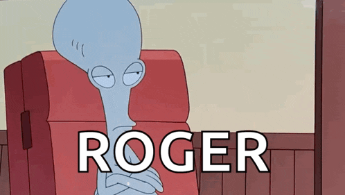 roger from american dad is sitting in a red chair with his arms crossed .