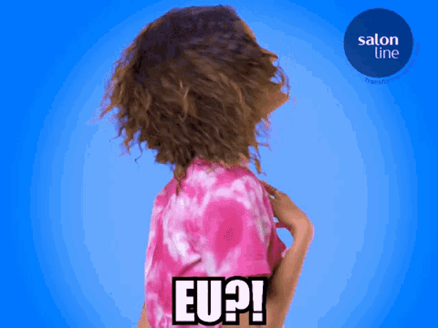 a woman in a pink tie dye shirt says eu ?!