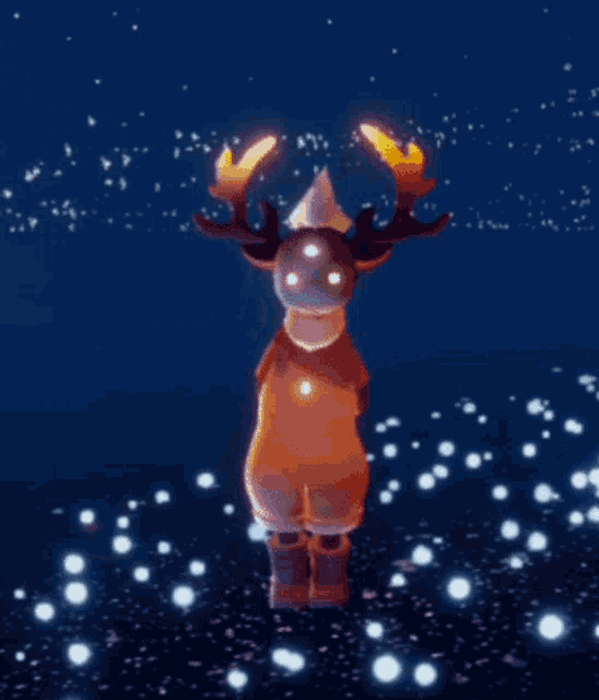 a person in a reindeer costume is standing in a field with a candle in their hand .