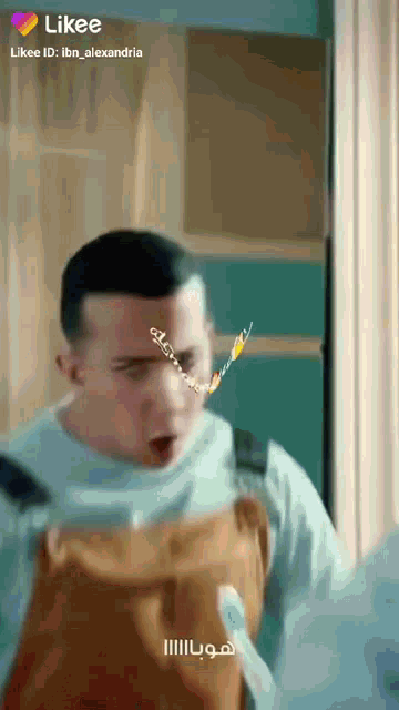 a screenshot of a likee video of a man with his mouth open