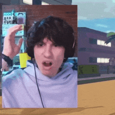 a man wearing headphones is making a funny face in front of a building