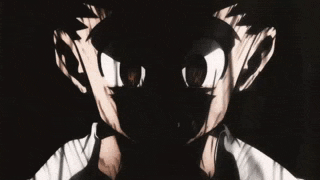 a close up of a person 's face with a shadow of a person on it .