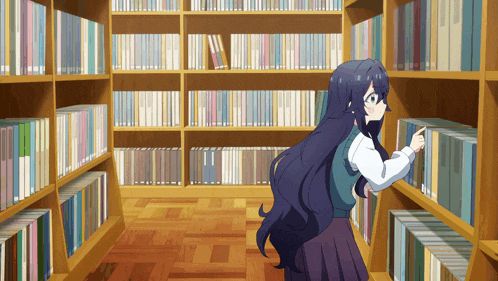 a girl in a library reaching for a book on a shelf