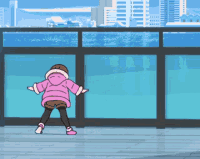 a girl in a pink jacket is standing on a balcony overlooking a city