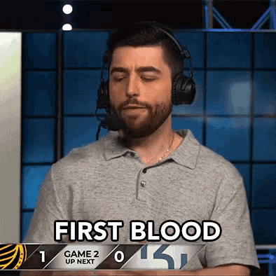 a man wearing headphones with the words first blood on the bottom