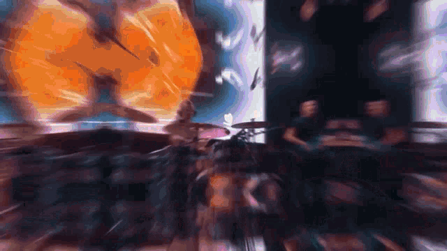a blurry picture of a drummer and a sign that says ' a ' on it