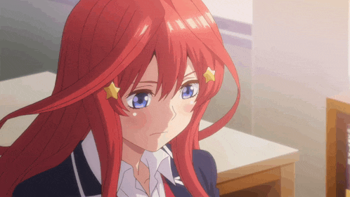 a girl with red hair and blue eyes has a star on her head