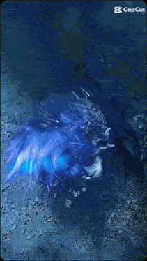 a computer screen shows a blue light coming out of a hole in the ice