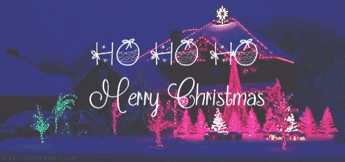 a sign that says merry christmas in front of a house with christmas lights