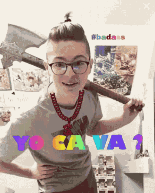 a boy wearing glasses and a necklace is holding a large axe with the words yo ca va on the bottom