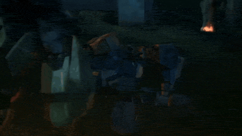 a computer generated image of a robot in a dark room with flames in the background