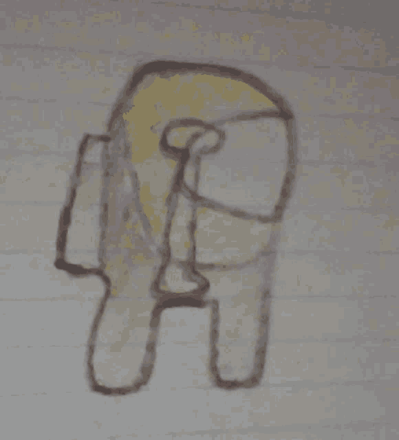 a drawing of an among us character on a piece of notebook paper