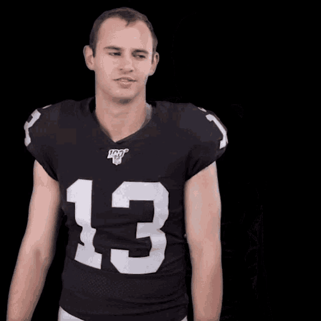 a football player with the number 13 on his shirt