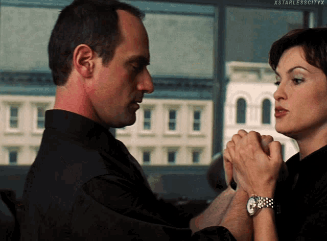 a man and a woman holding hands with xstarlesscityx written on the bottom of the image