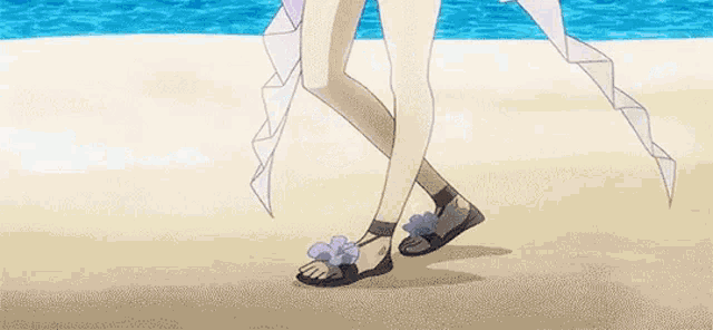 a woman is walking on a beach wearing sandals and a white dress .