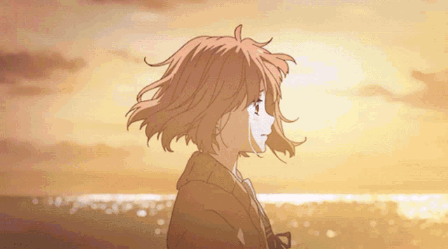 a girl with short pink hair is standing in front of a sunset