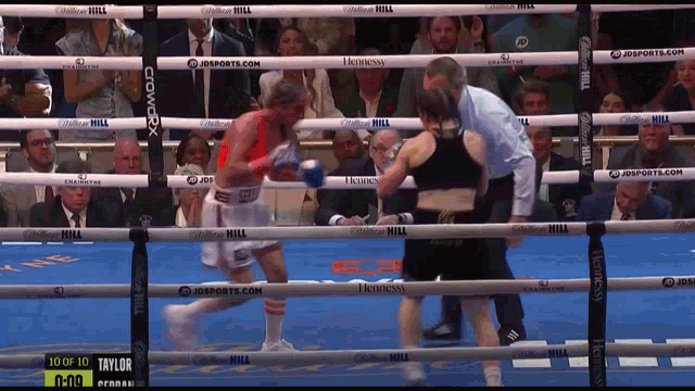 a boxing match is being shown on a screen that says 10 of 10 on it