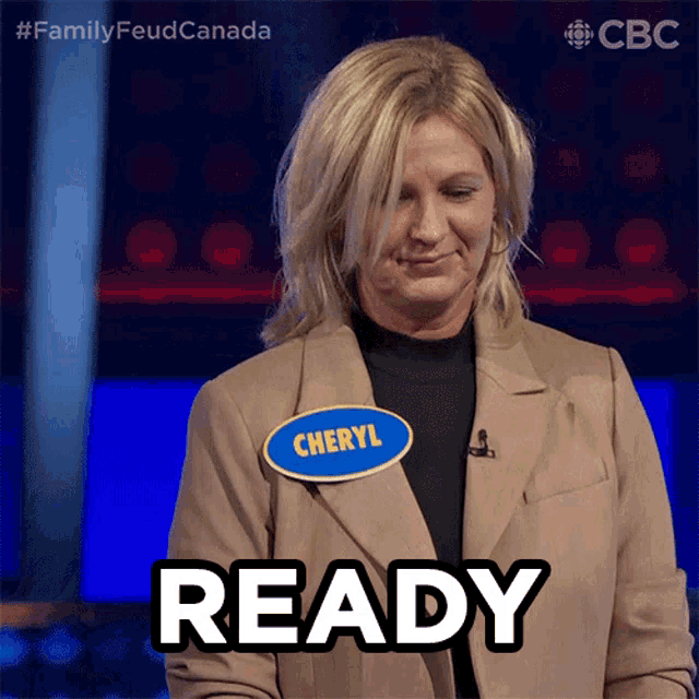 a woman wearing a name tag that says cheryl says ready