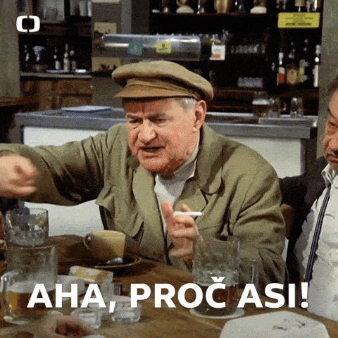 a man sitting at a table with a cigarette in his mouth and the words aha procasi