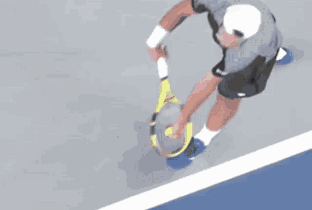 a tennis court with the word atptour on the net