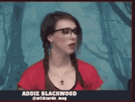 a woman wearing glasses and a red shirt with addie blackwood written on the bottom