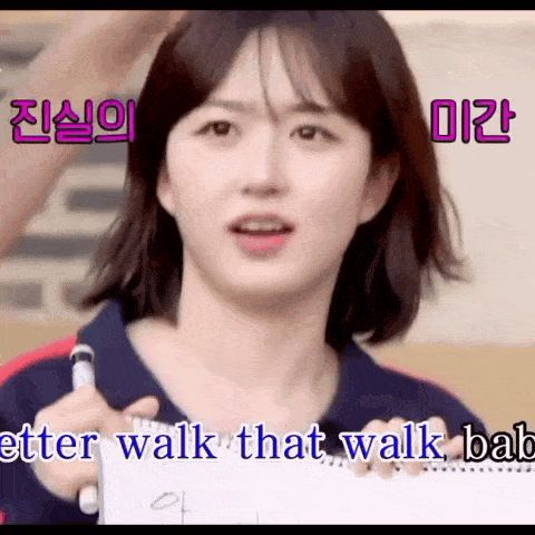 a woman is holding a piece of paper that says better walk that walk