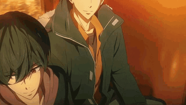 two anime characters are sitting next to each other and one has a green jacket on