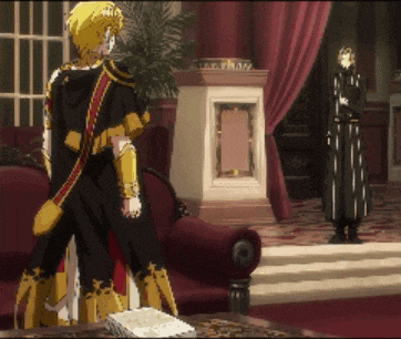 a man in a black and gold outfit is standing next to a couch