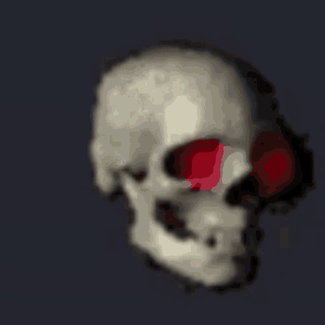 a skull with a bite taken out of it on a dark background .