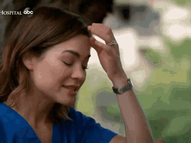 a close up of a woman 's forehead with the words hospital abc on the bottom