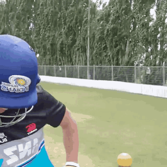 a man wearing a blue hat that says ' chennai super kings '